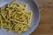 Raw strozzapreti, specialties from northern Italy, fresh twisted pasta that cooks very quickly and is suitable for chunky sauces