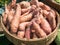 Raw sweet potatoes in organic farmer market