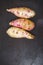 Raw sweet potatoes on wooden background closeup. sweet potato on wooden surface. Ipomoea batatas or Shakarkandi