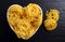 Raw tagliatelle in a heart shaped bowl