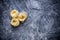 Raw tagliatelle nido on the flour-dusted black wooden background