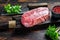 Raw Top Blade beef meat steak. Dark wooden background. Top view