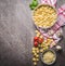 Raw tortellini pasta in bowl with ingredients, ready for cooking on rustic background , top view . Italian cuisine