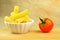 Raw tortiglioni pasta in a small bowl