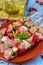 Raw turkey meat and vegetables skewers