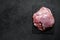 Raw Turkey thigh fillet. Farm eco meat.  Dark background. Top view. Space for text