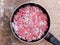 Raw twisted beef meat with onion