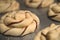 raw unbaked dough chocolate babka twist danish buns with chocolate on a pan abstract close up with bohkeh