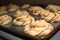 Raw unbaked dough chocolate babka twist danish buns with chocolate on a pan ready for the oven abstract close up with bohkeh