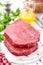 Raw, uncooked beef meat steaks on white wooden background