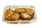 Raw uncooked lemon and coconut marinated chicken fillets in a plastic tray. Poultry product. Meat industry, Summer barbecue range