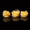 Raw uncooked tagliatelle nests on black background with reflection. Traditional Italian pasta