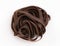 Raw unprepared chocolate pasta noodles isolated