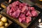 Raw veal beef for stew and potatoe, on old dark  wooden table