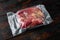 Raw veal calf brisket beef,with ingredients for smoking  making  barbecue, pastrami, cure, vacuum sealed ready for sous vide