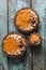 Raw vegan dessert for family. Pumpkin tarts with nut and oatmeal