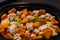 Raw vegetables cut into small pieces prepared for steaming, cauliflower, butternut, leek, carrot