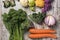 Raw vegetables on a white rustic wooden table