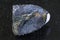 raw Vivianite stone on dark background