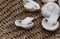 Raw White button mushrooms on rustic styled table surface