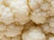 Raw white cauliflower organic texture in abstract form look like snow mountain or hill used as background