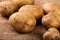 Raw whole washed organic potatoes