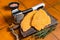 Raw Wiener Schnitzel breaded meat steak. Orange background. Top view