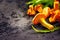 Raw wild chanterelle mushrooms on dark old rustic table background. Organic fresh chanterelles background