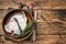 Raw wolffish or wolf fish fillet in a wooden plate. wooden background. Top view. Copy space