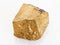 raw yellow Chalcopyrite stone on white marble