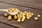 Raw yellow soya bean on brown wood