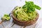 Raw zucchini pasta on white background