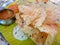 Rawa dosa sambhar with coconut chutney served on banana leaf south indian dish