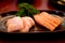 Raws fresh salmon fillet on dish in restaurant