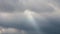 The rays of sunlight pass through the gaps in the clouds, form `light columns`