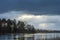 Rays of sunlight that pass through gaps in the clouds and form visible ` light columns `or ` waves`, thunderous evening clouds.