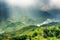 Rays of sunlight through storm clouds at highlands, Vietnam