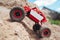 Rc crawler overcoming mountain rise, close-up