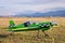 RC model green plane on runway