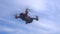 RC quadcopter hovers in the air, slow motion