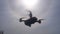 RC quadcopter hovers in the air, slow motion
