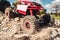 Rc suv pulling through rocky landscape