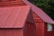 Rd painted vintage sheds made from corrugated sheet metal