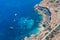 Rdum Il-Hmar cliffs and nice dive site between massive boulders near Mellieha in Northern Region of Malta.