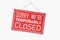 We`re closed hanging sign. Red Sign for door. Sorry we`re temporarily closed text. Vector realistic illustration.