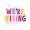 We`re hiring sign. Fun multi colored lettering text.