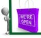 We\'re Open Shopping Bag Sign Shows New Store Launch
