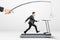 Reach a goal concept with businessman running on a treadmill for