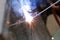 The reaction of welding wire and metal with smoke fire and spark