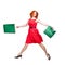 Readhead with green shopping bags jumping